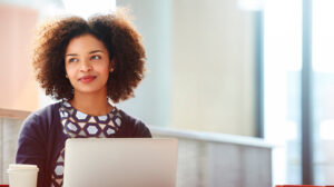 Woman attending a building resilience workshop through her organization's resilience training for employees via an online, research-based resilience course, "Burn Bright: The Resilience Advantage" from the Center for Creative Leadership